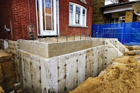 16639373 Building Addition To Residential House With New Foundation
